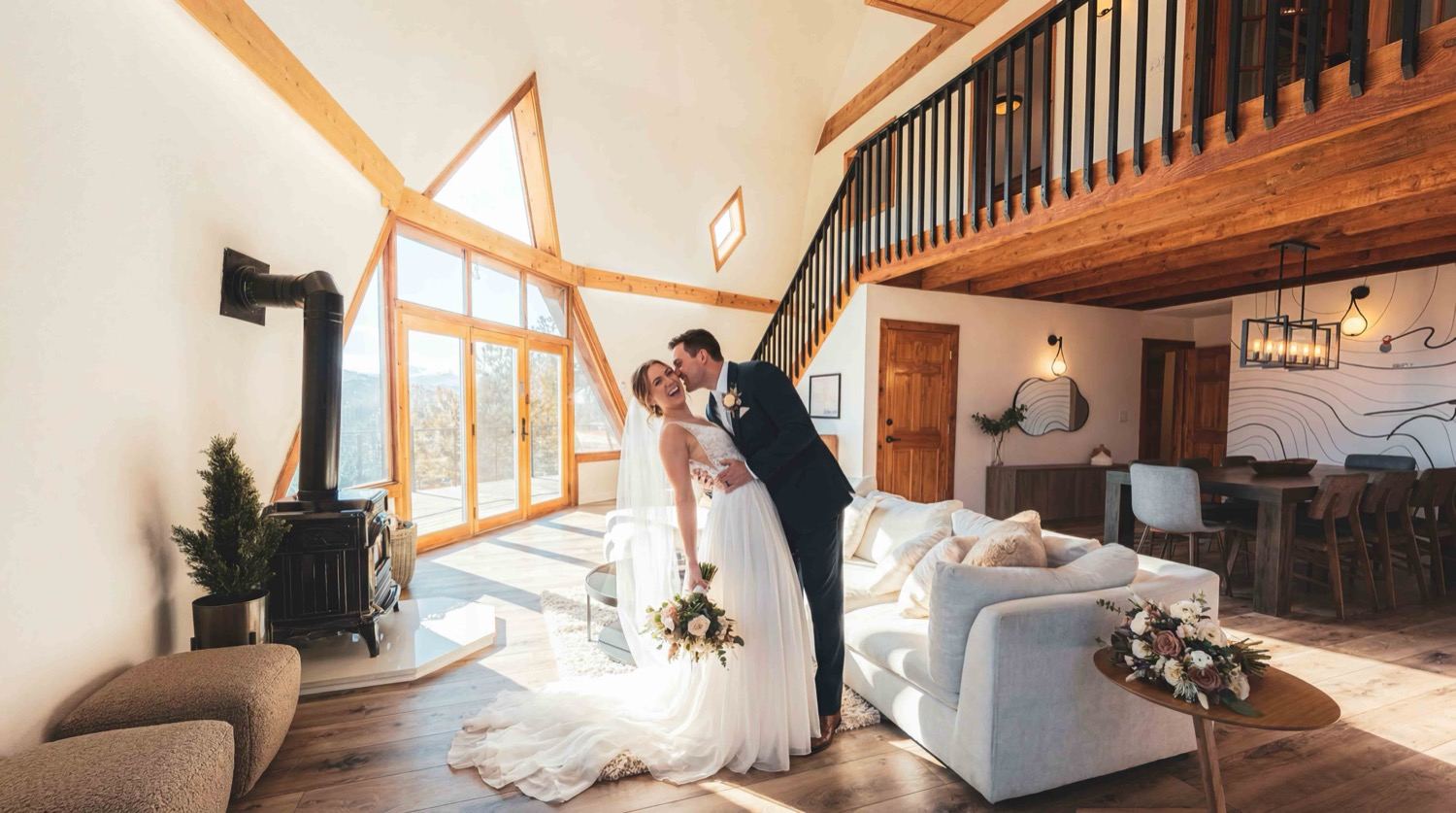 A couple sharing a moment in the dome's light-filled living room